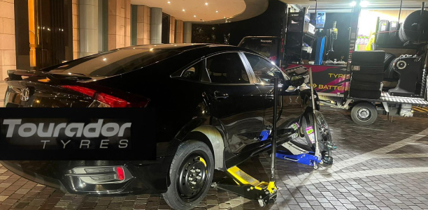 Onsite Tyre Repair on a Black Honda