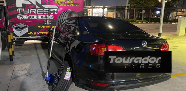 Onsite Tyre Repair on a Black Volkswagen