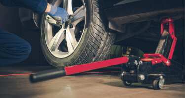 Changing Flat Tyre