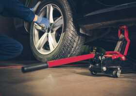 Changing Flat Tyre