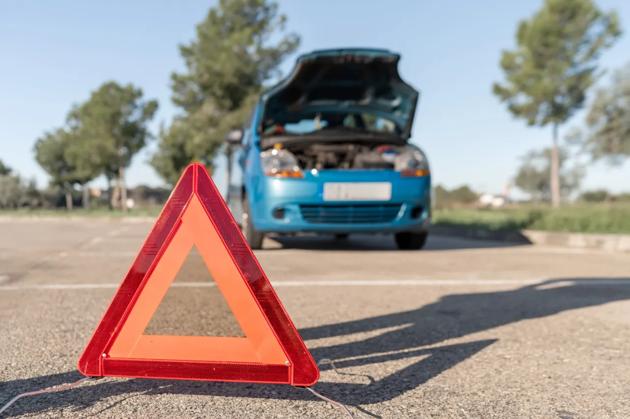 A car breaking down on the roadside